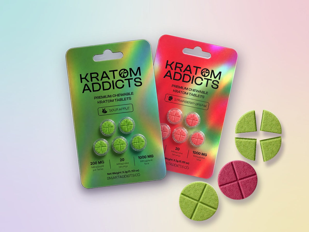 Two Kratom Addicts tablet packs with loose tablets in front, one broken into quarters